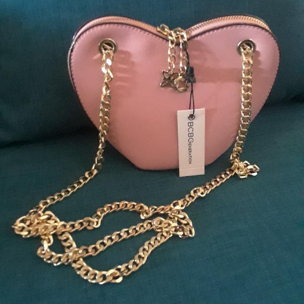 BCBG Hart shaped cross-body bag on blush color
